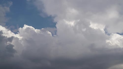Dramatic Cloudscape with Billowing White and Gray Clouds