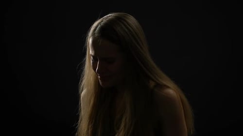 Blonde Woman Sobbing and Crying, Suffering Because of Break-Up or Divorce