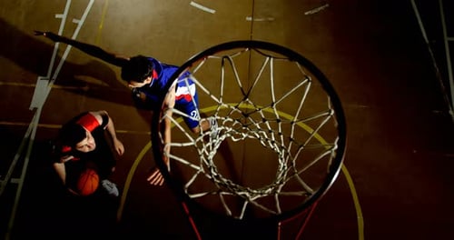 Competitors playing basketball in the court 4k