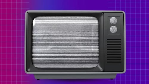 Front view of an old TV sizzling with palm trees on screen