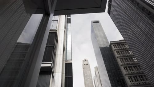 New York Manhattan. Low Angle View of Modern Skyscrapers and Towers, Slow Motion