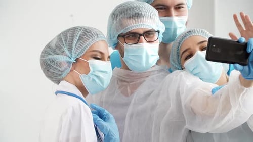 Medical Staff Posing for Selfie in Hospital