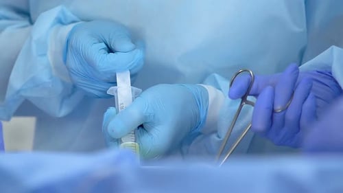 Surgeon Filling Syringe During Liposuction Operation, Plastic Surgery, Health