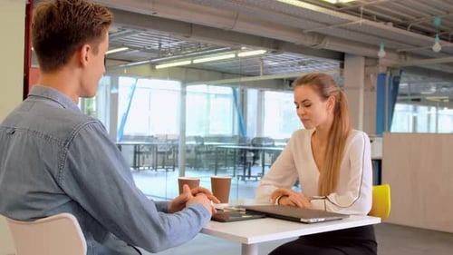 Employees in Start Up Company Have Coffee Break