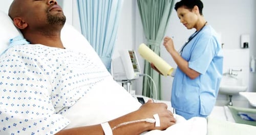 Female doctor setting up medical machine