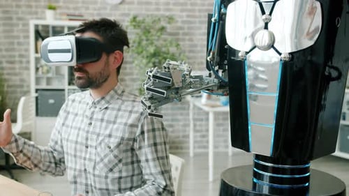 Human and Robotic Arm Doing Same Movements, Guy in Vr Glasses Testing Machine