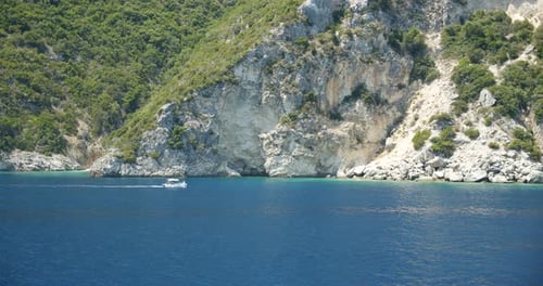 Tourist Pleasure Boat in Blue Sea Near Beautiful Ionian Island