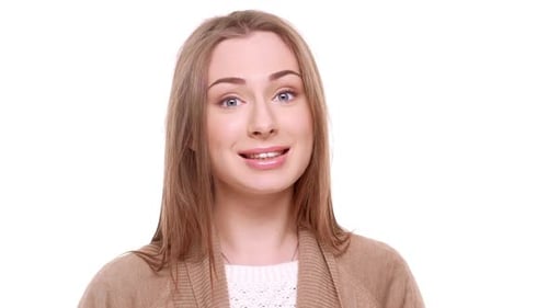 Woman Smiling and Nodding on White Background