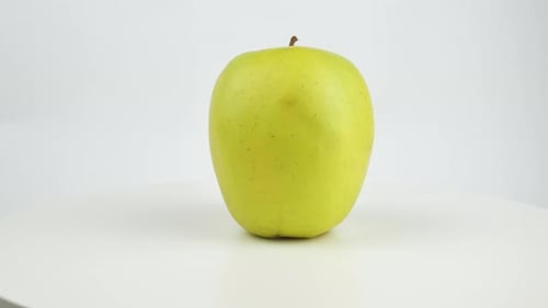 Green Apple Rotate on White Background
