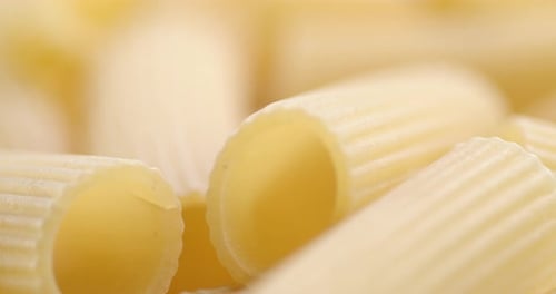 Extreme Close Up of Uncooked Rigatoni Pasta