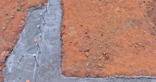 The Construction of a Strip Foundation Reinforcement Frame for a Reinforced Concrete House Building