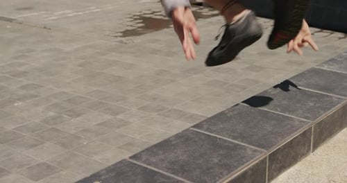 Caucasian man practicing parkour