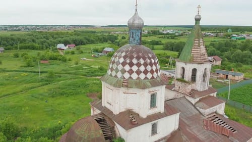 Old Christian Church in the Middle of the Green Field