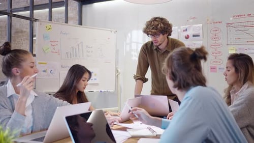 Team Meeting at Modern Urban Workplace