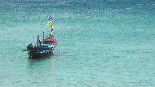 Thai Fishing Boat on Turquoise Waters