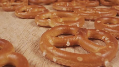 Golden Brown Pretzels on a Wood Surface