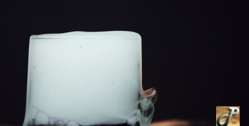 Foam Overflowing a Pint Glass