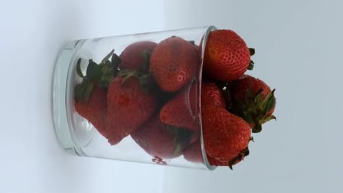 Juicy Strawberries in a Glass Container