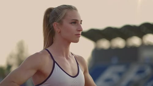 Woman Stretching Before Athletic Workout Outside
