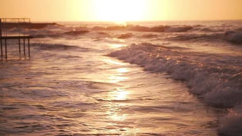 Golden Beach Waves Under Sunrise