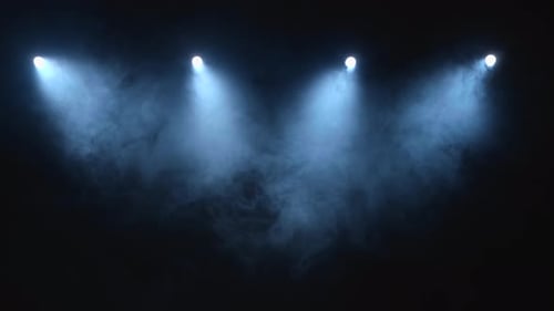 Flow Stage of Formless Smoke Swirling Against a Black Background