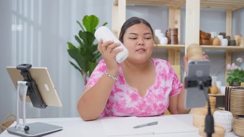 Woman Recording Video About Pottery for Social Media