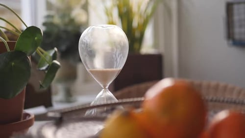 Hourglass with Sand Falling Slowly Indoors