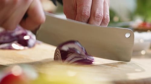 Slicing Red Onion with Large Cleaver