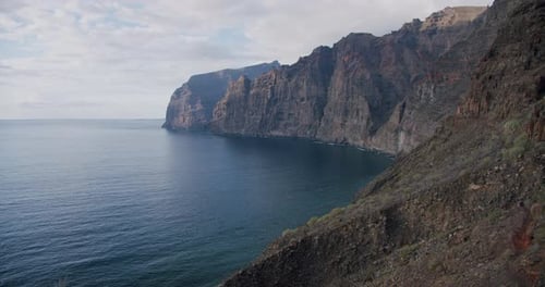 Amazing Ocean View of Los Gigantes Cliifs and Beach at Sunset Tenerife Canary Islands Spain