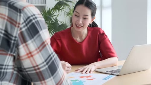 Asian colleague male and female friend casual dress meeting consult work