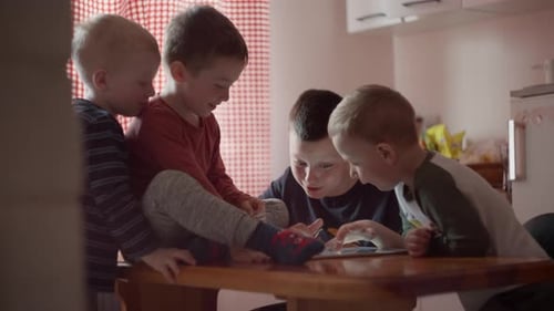 Group of Children Watching a Tablet