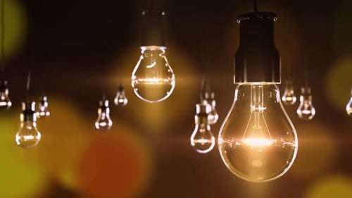 Decoration with Hanging Light Bulbs Against the Retro Yellow Background Loop