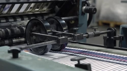 Printing Press Machine in Operation at Workplace