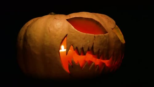 Halloween Jack-o'-lantern Glowing on Black