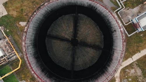 Camera Rises Up Over Cooling Tower at Heat Power Station