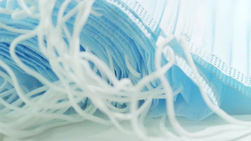 Stack of New Disposable Medical Face Masks