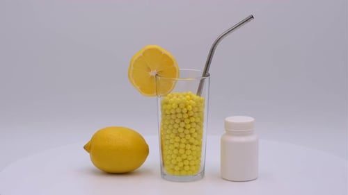 Lemon and Vitamin C Capsule Still Life