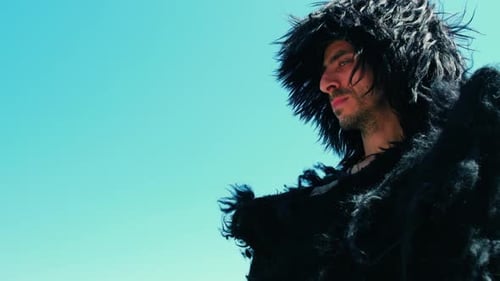 Man in Fur Hood and Coat in Desert