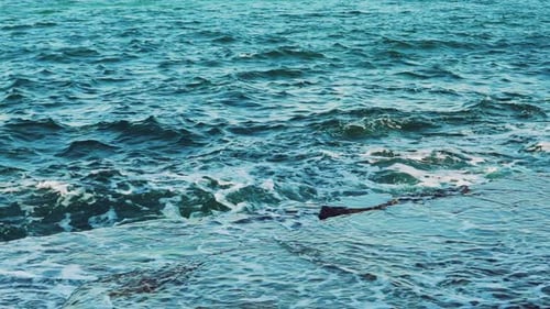 Crashing Waves on Rocky Shoreline