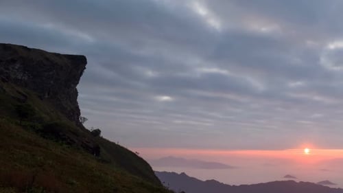 Scenic Mountain Sunrise With Misty Cloudscape