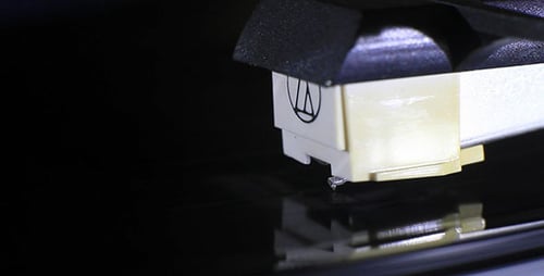 Record Player Needle on Vinyl Record Spinning