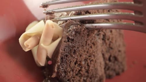Macro Shot of Chocolate Cake Being Eaten