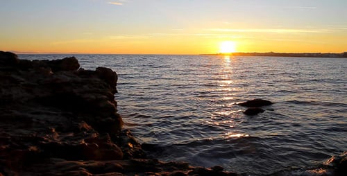 Sunset On the Rocky Beach