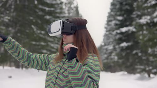 Woman Uses Virtual Reality Glasses on the Street