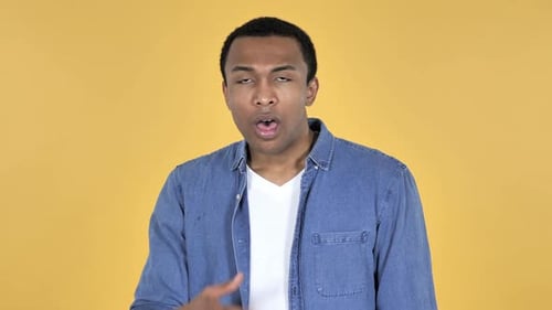 Man Reacts with Surprise and Covers Mouth