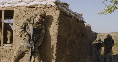 Soldiers Leaving Dangerous Area Under Fire