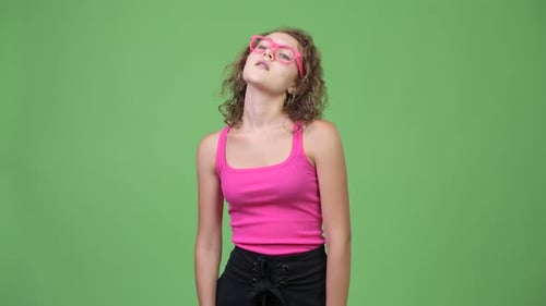 Young Person with Curly Hair Standing