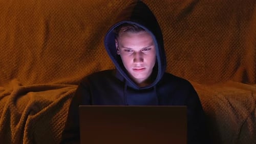 Young Man Playing Video Game on Laptop at Night, Technique Problems, Close Up
