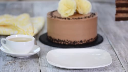 Chocolate Cake Slice Served With Tea