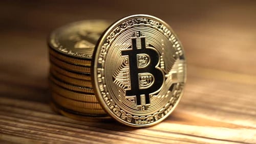 Material Symbol of Virtual Digital Currency Silver Coin Bitcoin. Close Up
